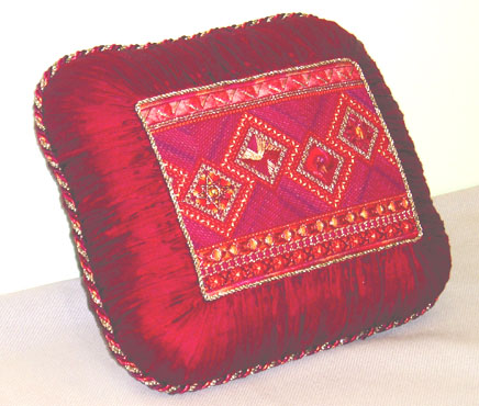 The Red Pillow -- the "Kilimanjaro" pattern stitched in the "Congo" colorway